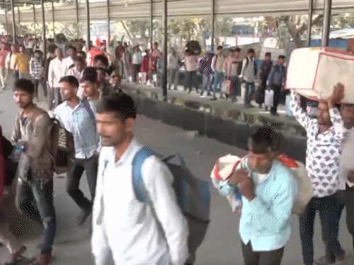 surat migrant workers return home dut to gas shortage inflation