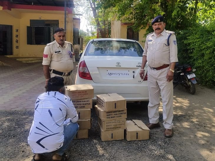 नरसिंहपुर में 11 पेटी देशी शराब के साथ कार जब्त:अवैध परिवहन करते एक आरोपी गिरफ्तार, पुलिस ने घेराबंदी कर पकड़ा